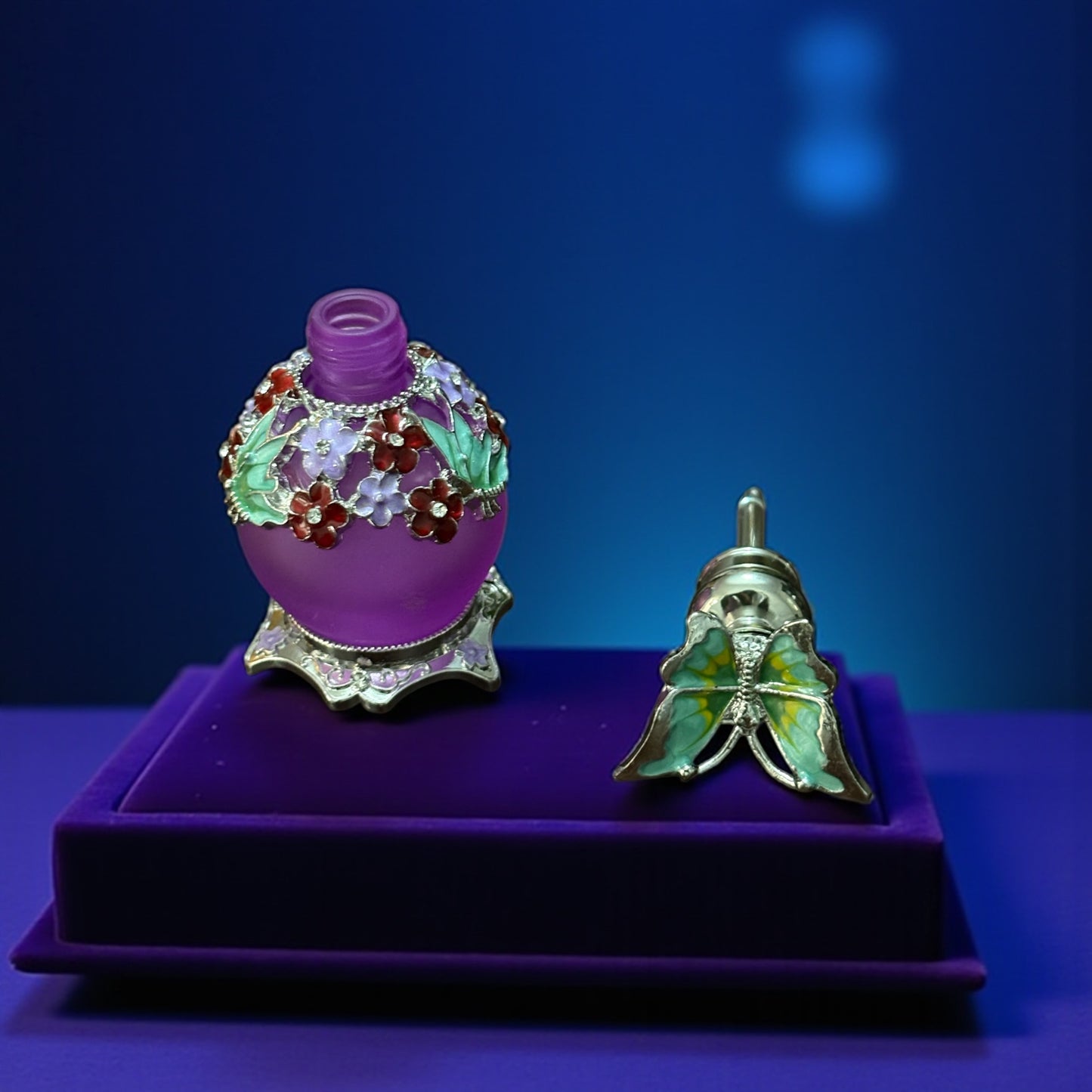 Lavender butterfly and flower perfume bottle