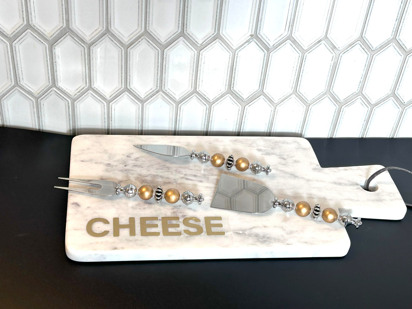 Marble cutting board and three-piece charcuterie set
