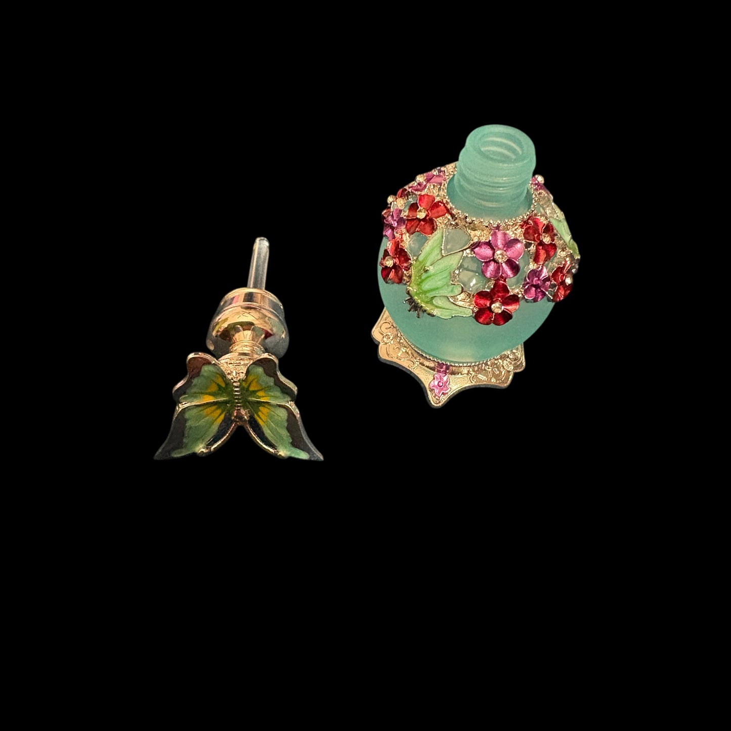 Stunning butterfly and flower perfume bottle