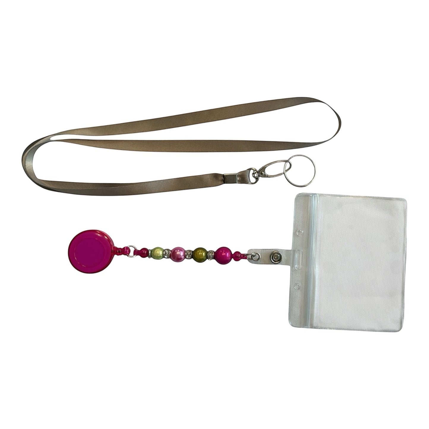 House of Lux Gifts retractable badge lanyard with pink and green beads, clear ID holder, and smooth beige strap.