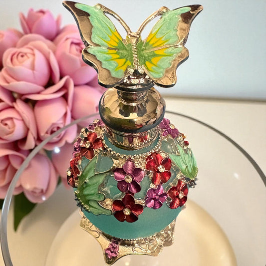 Stunning butterfly and flower perfume bottle