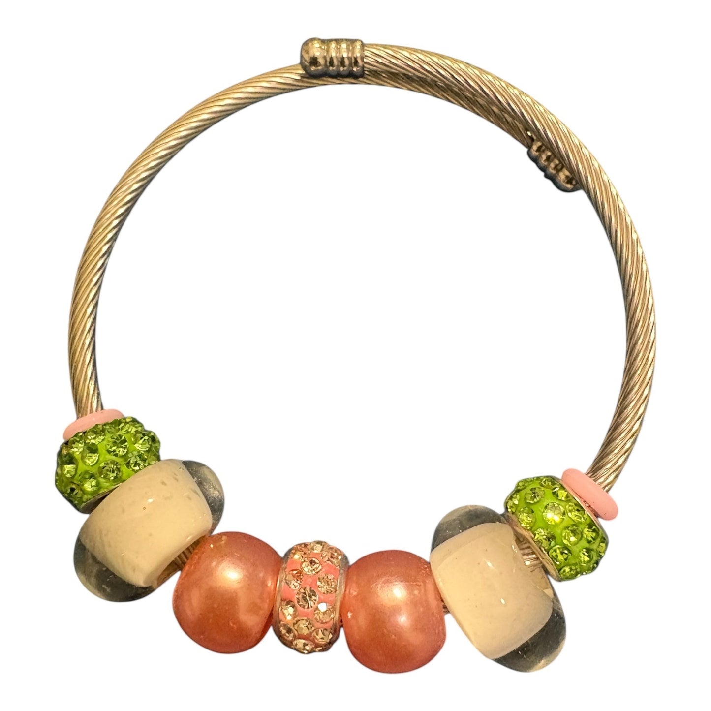House of Lux Gifts handmade bangle bracelet featuring lime green rhinestone, peach, and cream beads on a gold wire.