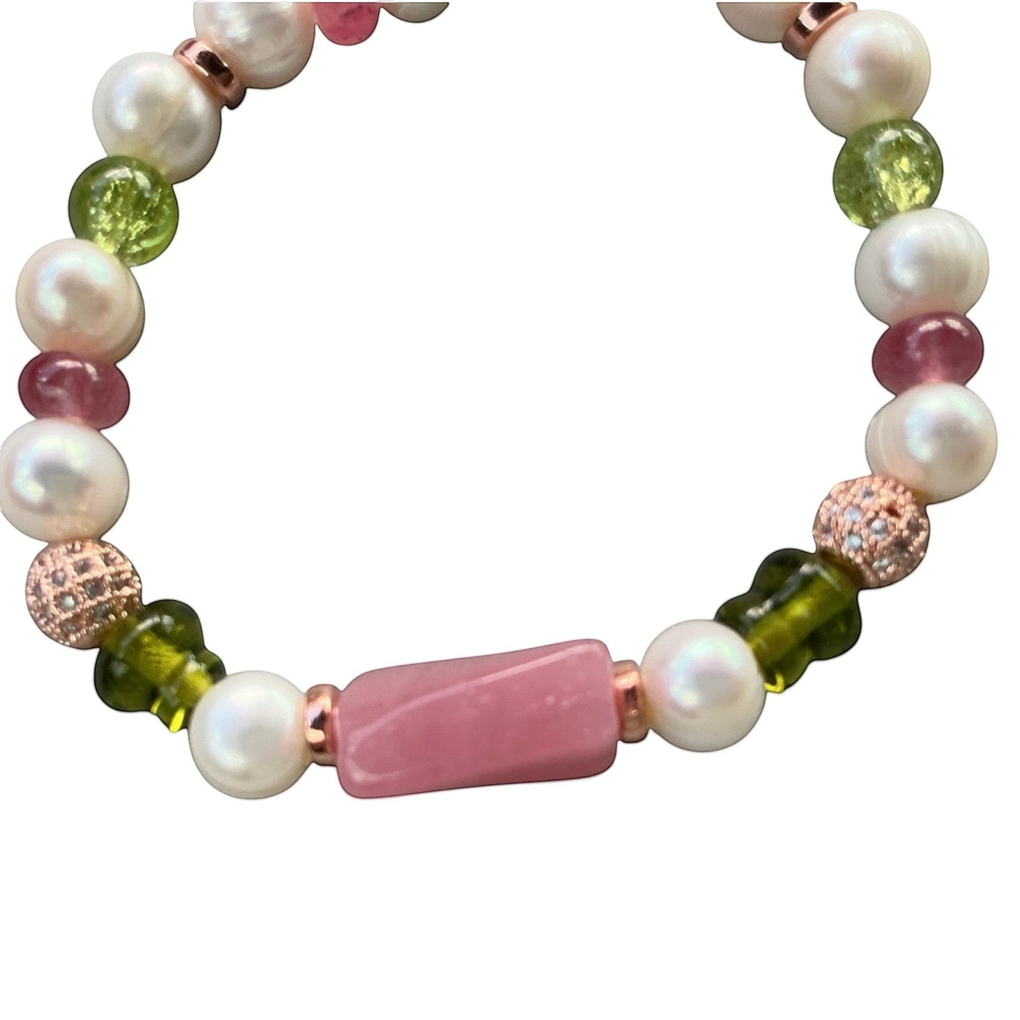 House of Lux Gifts stretch bracelet with white pearls, green peridot, pink gemstones, and rose gold pave-set spacers.
