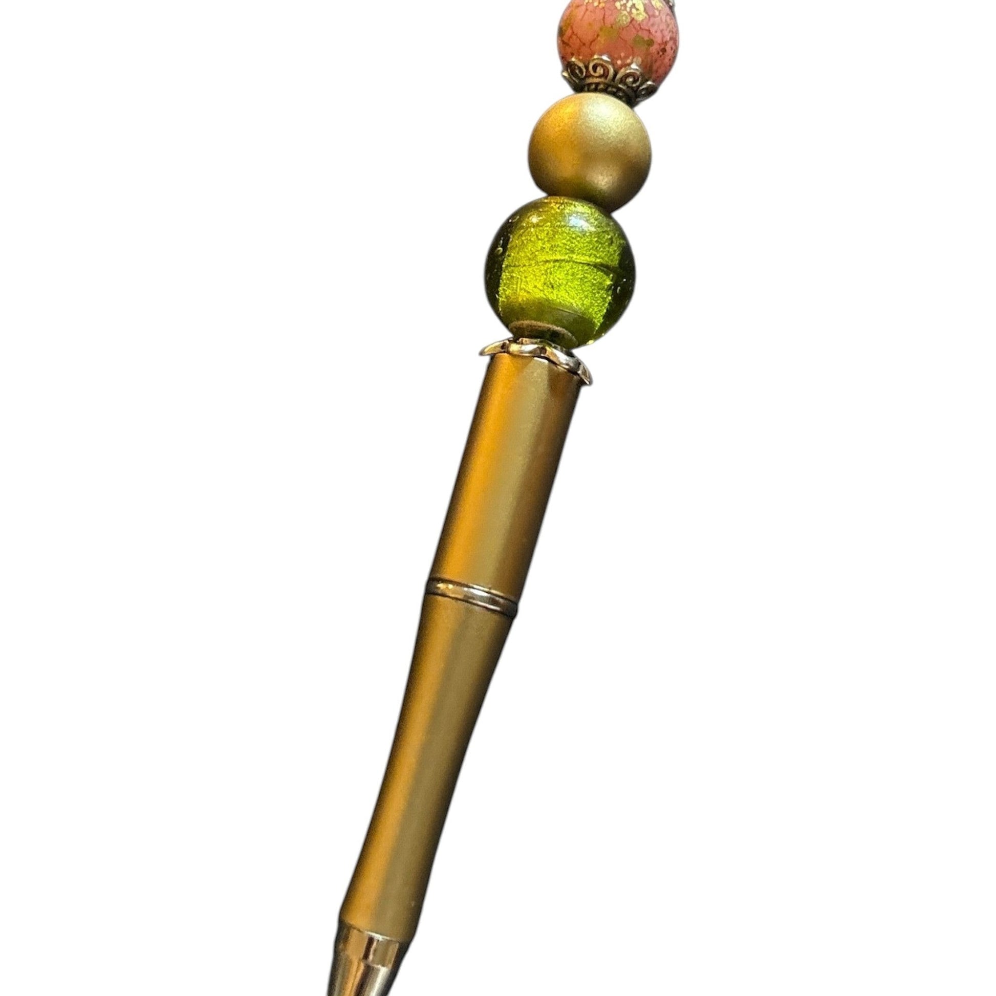 House of Lux Gifts metallic gold writing pen with decorative pink, gold, and green beads and silver spacers.