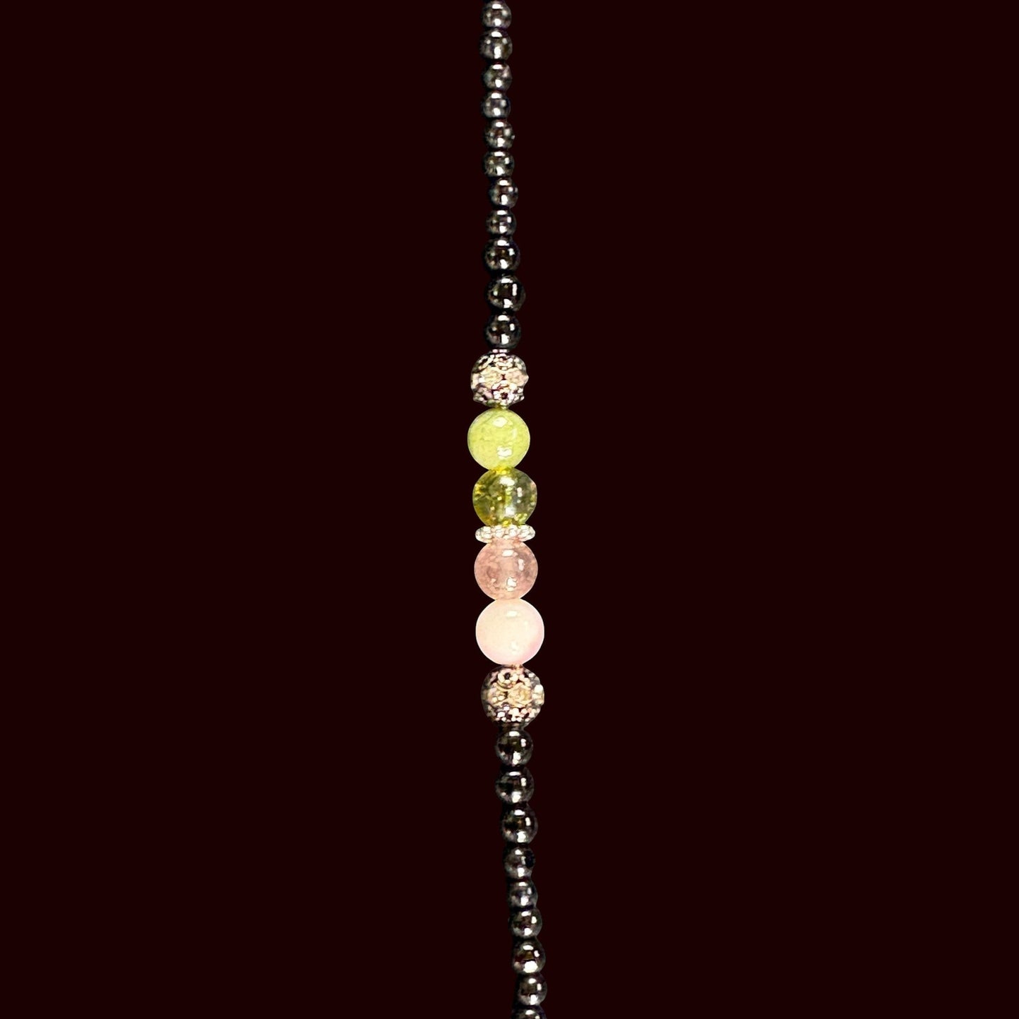 House of Lux Gifts handcrafted beaded shoulder strap with pink, green, and black glass beads for an evening clutch.