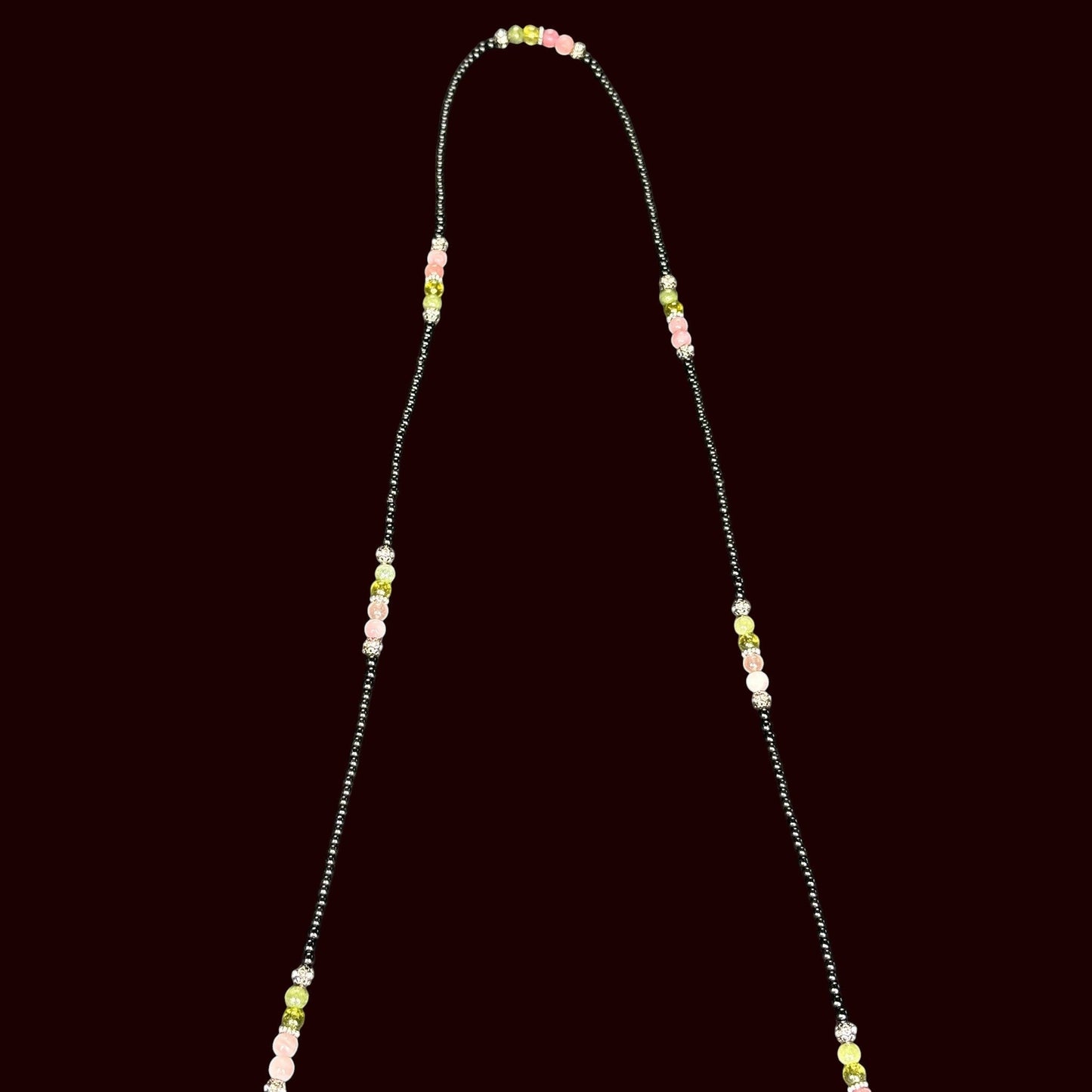 House of Lux Gifts handcrafted beaded shoulder strap with pink, green, and black glass and rhinestone accents.