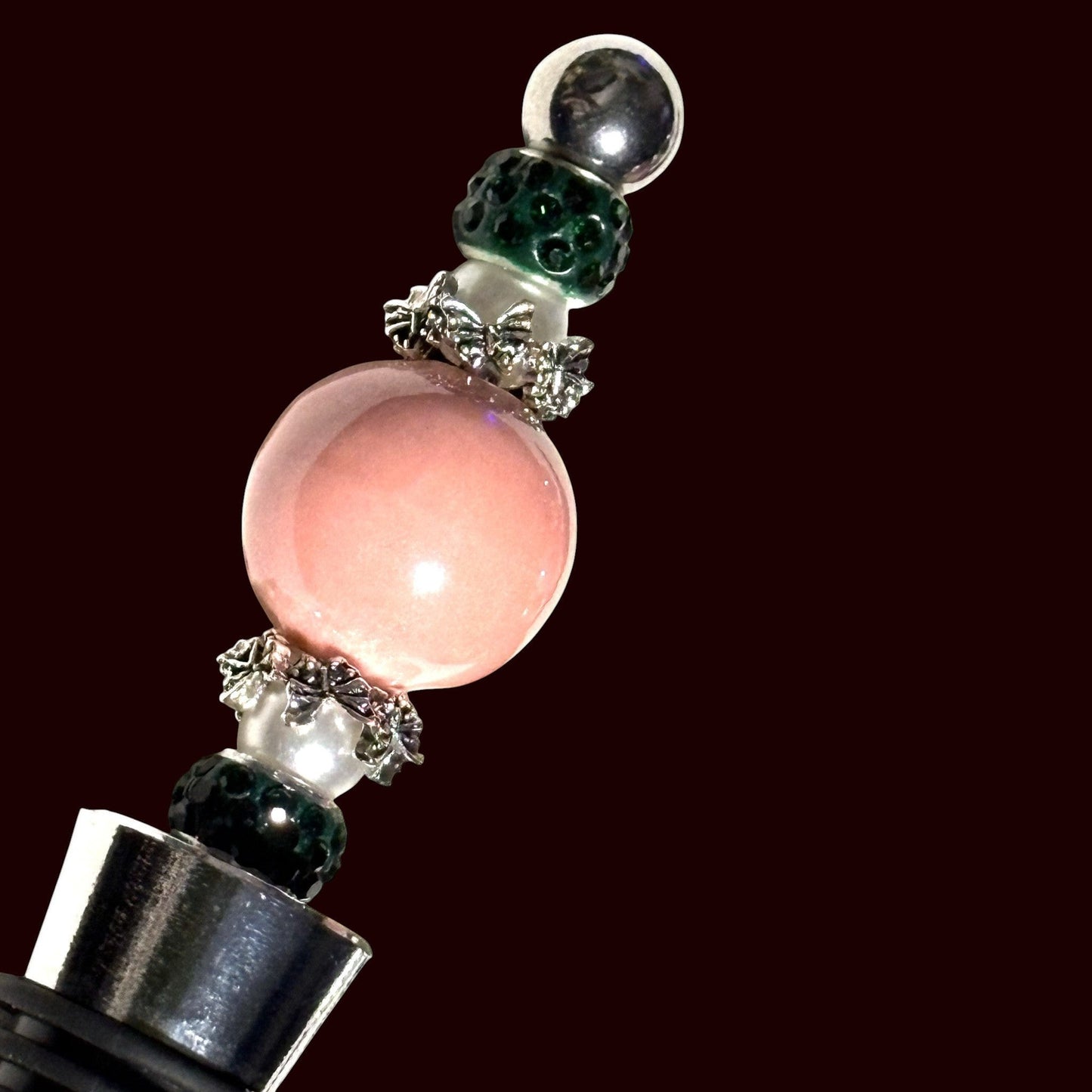 House of Lux Gifts pink and green beaded wine bottle stopper with decorative metal accents