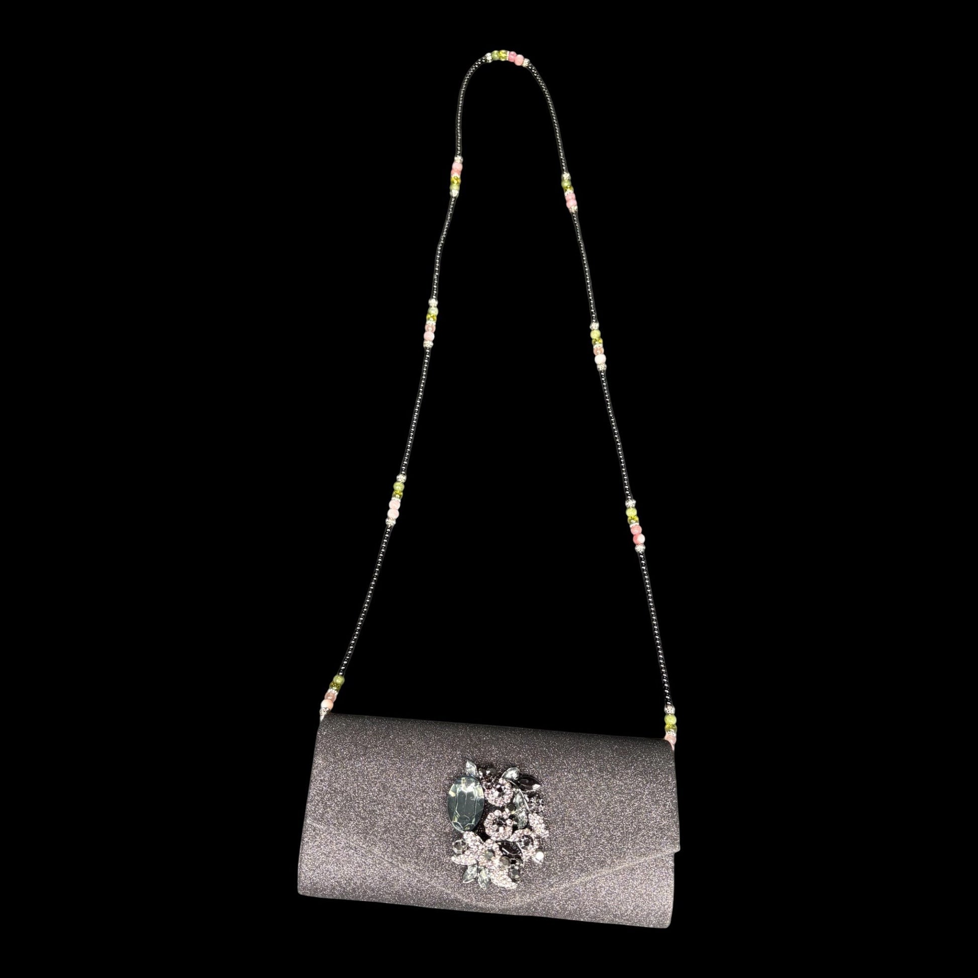 House of Lux Gifts black crystal evening clutch with a beaded shoulder strap featuring pink and green accents.