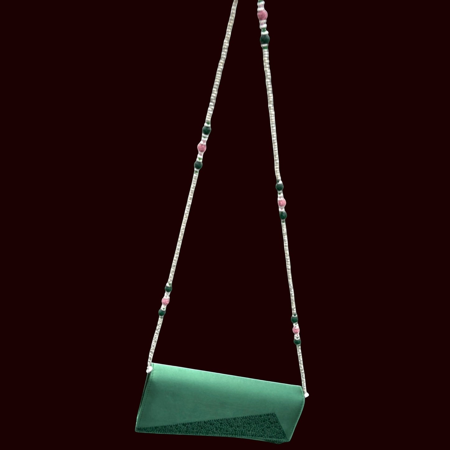 House of Lux Gifts green evening clutch with a detachable beaded pink and green strap and rhinestone accents.