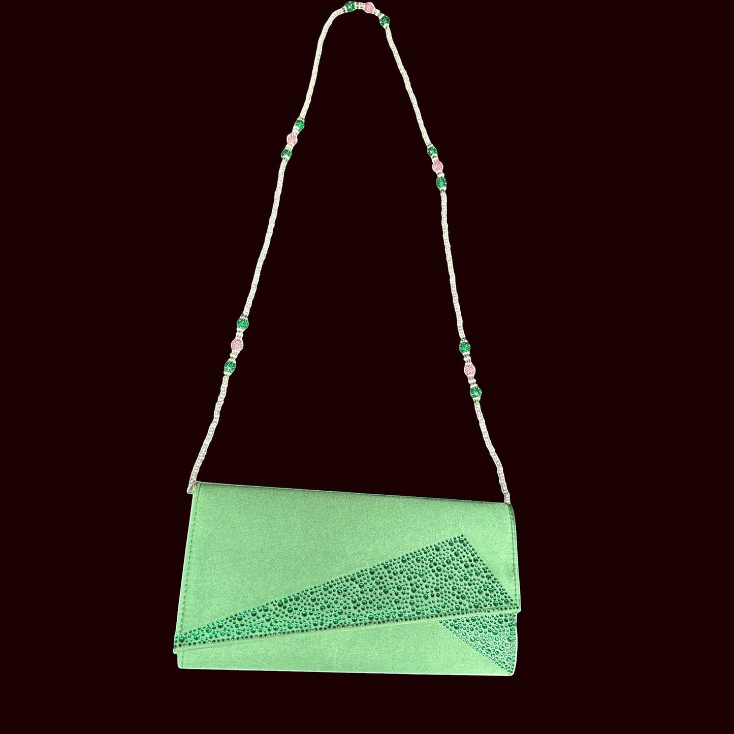 House of Lux Gifts green evening clutch with rhinestone accents and a detachable pink and green beaded shoulder strap.