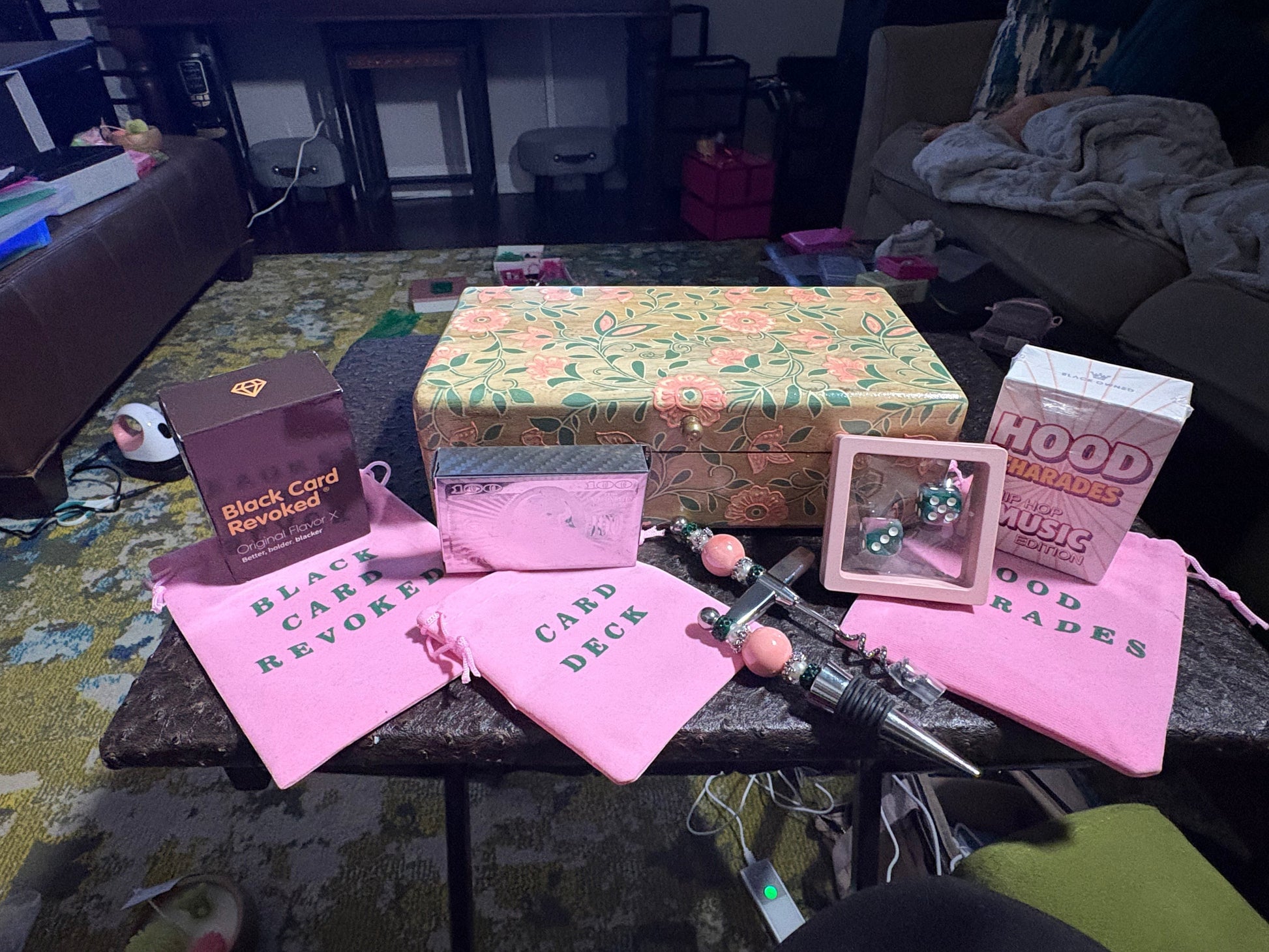 House of Lux Gifts pink and green Las Vegas game night luxury box with velvet game sets, dice, and wine accessories.