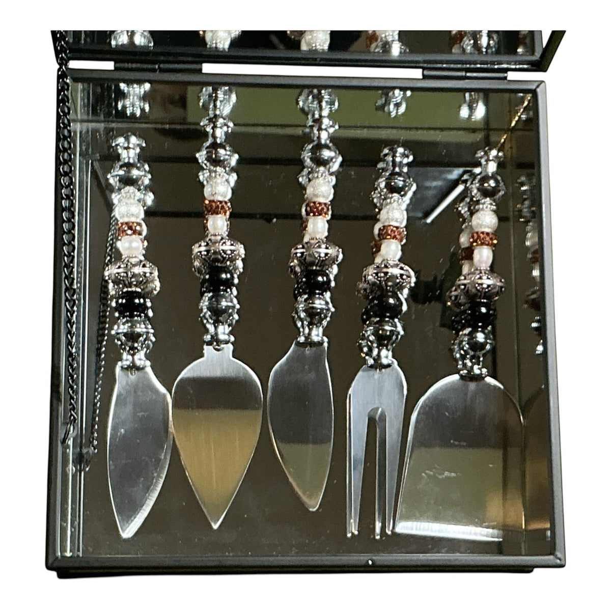 House of Lux Gifts mirrored charcuterie gift box containing five stainless steel serving tools with beaded handles.