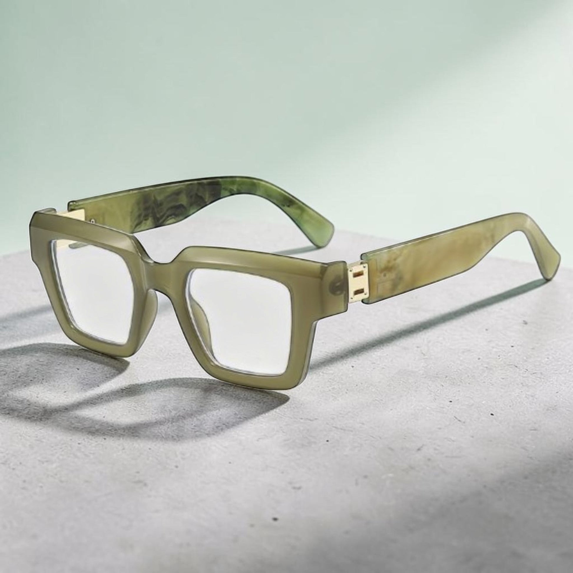 House of Lux Gifts olive green reader glasses with a thick square frame and gold-tone temple accents.