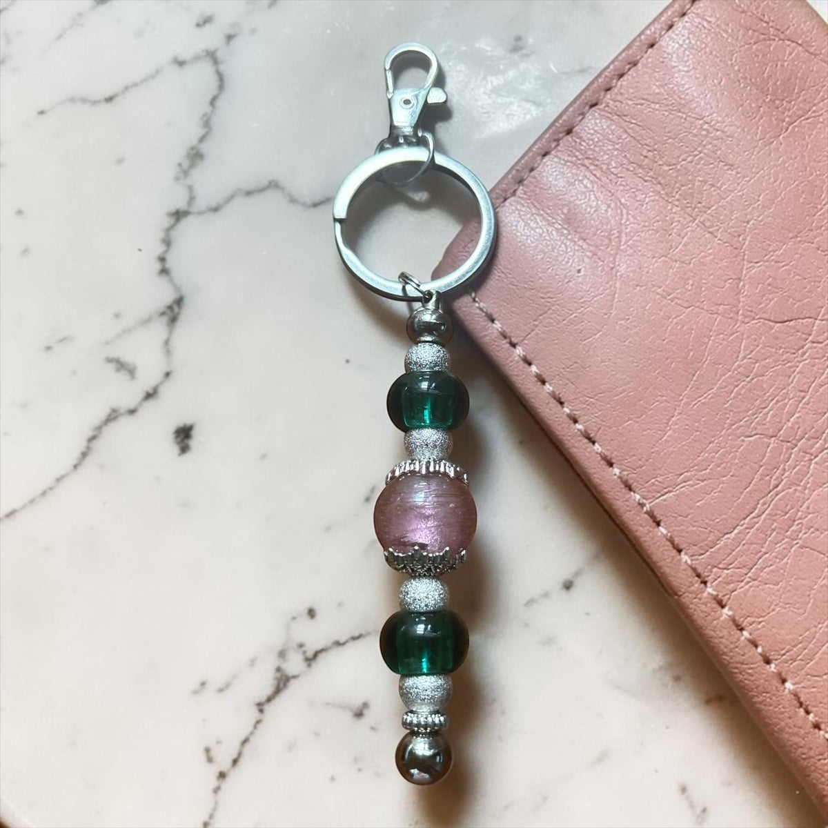House of Lux Gifts pink and green glass lampwork beaded keychain and bag charm with silver metal accents