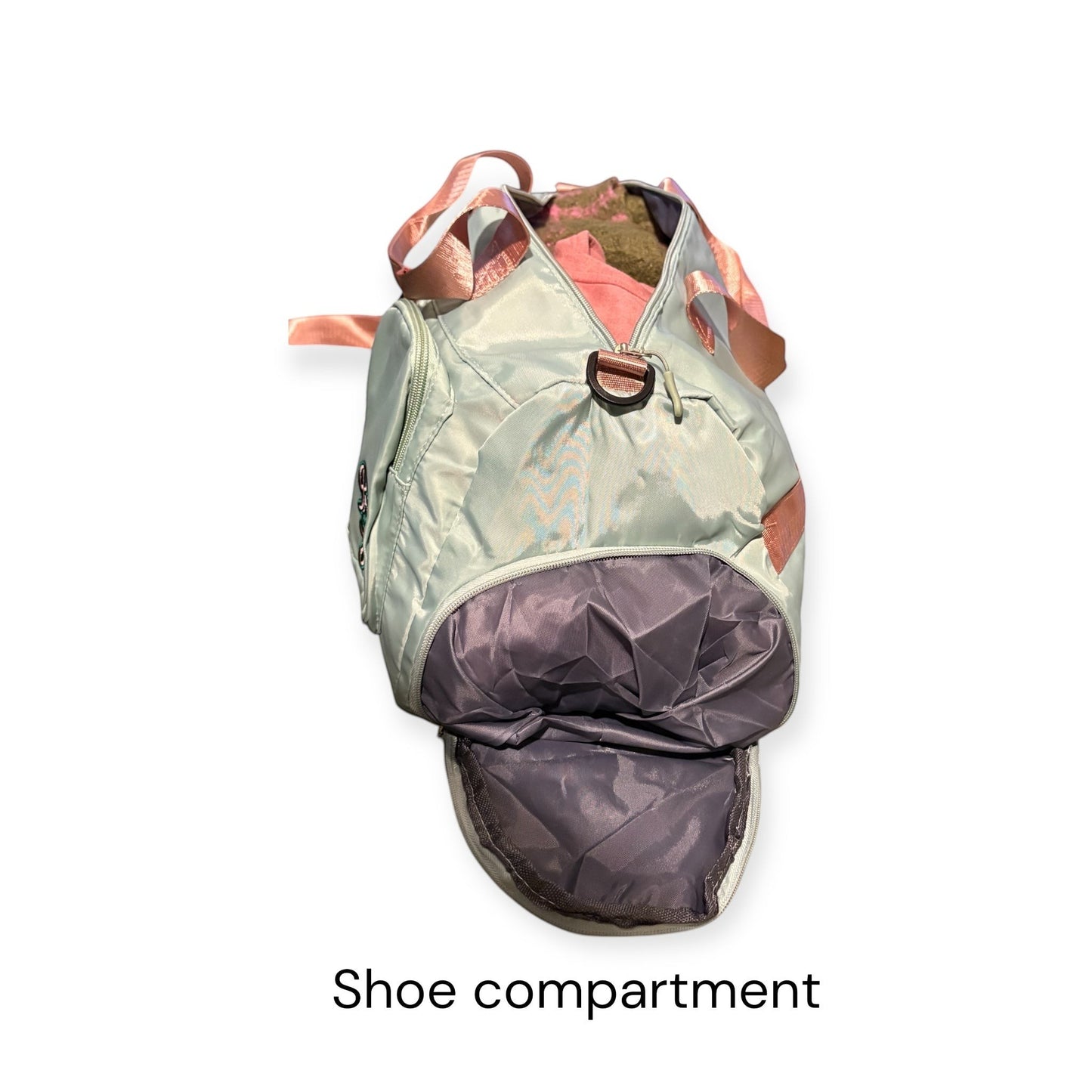 House of Lux Gifts pink and green travel duffel bag showing the side shoe compartment and pink carry straps.