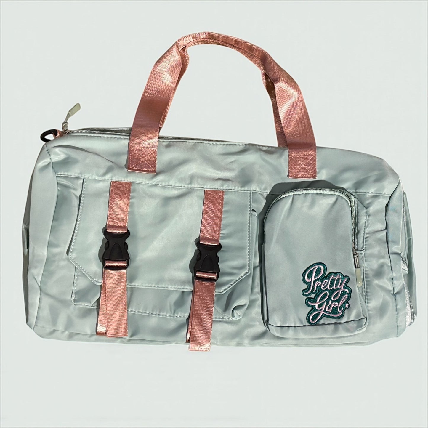 House of Lux Gifts pink and green Pretty Girl travel duffel bag with front pockets and embroidered detail