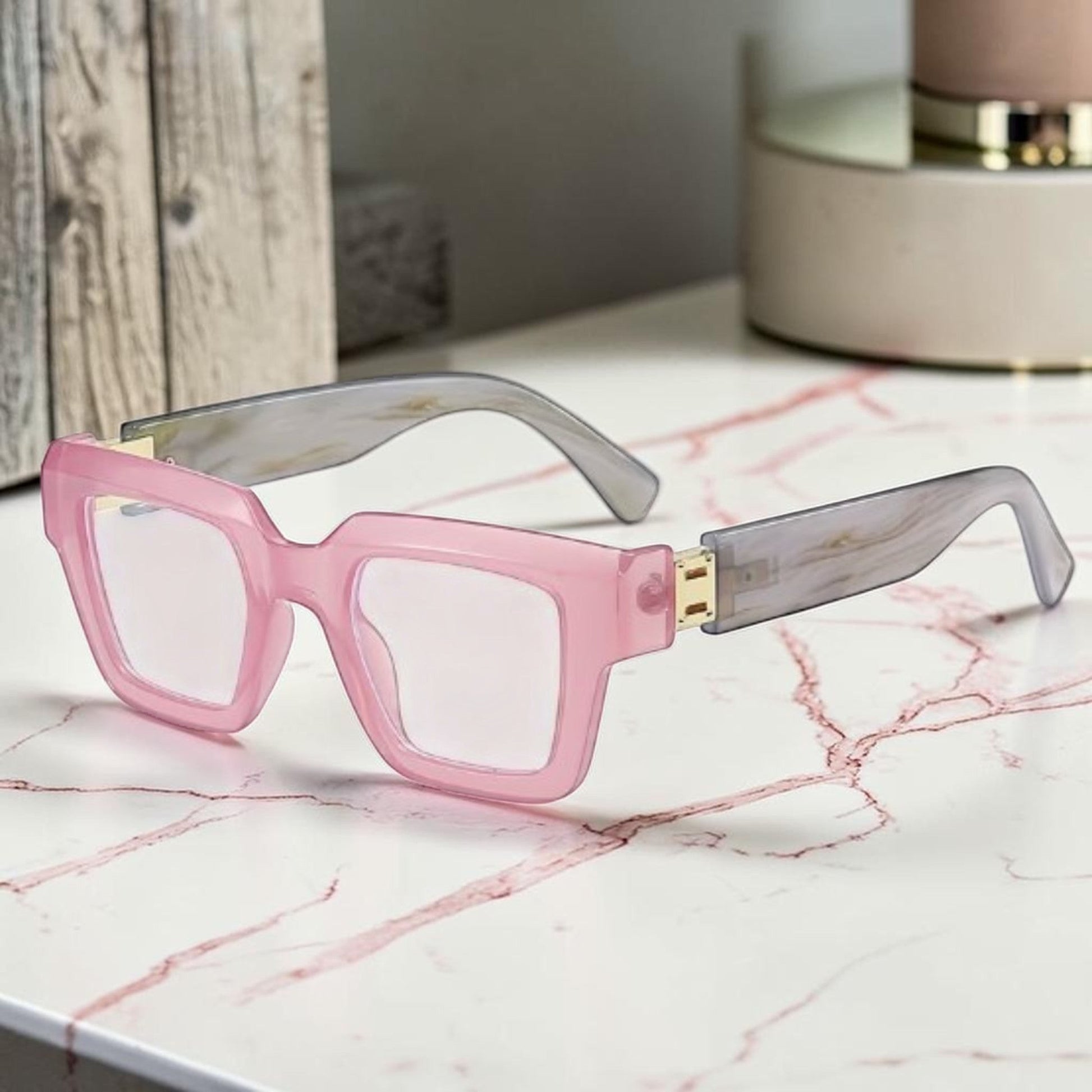 House of Lux Gifts pink and grey square reader glasses with a marbled finish on the temples.